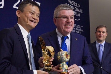 Alibaba CEO Jack Ma and IOC President Thomas Bach at the signing ceremony in Davos