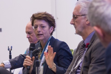 Sarah Lewis speaking at Host City 2015 (between Slovenian NOC President Janez Kocijancic and UCI President Brian Cookson)